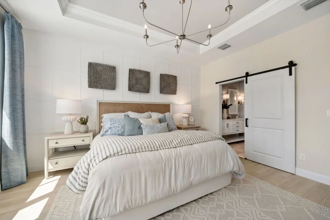 Primary suite with decorative feature wall