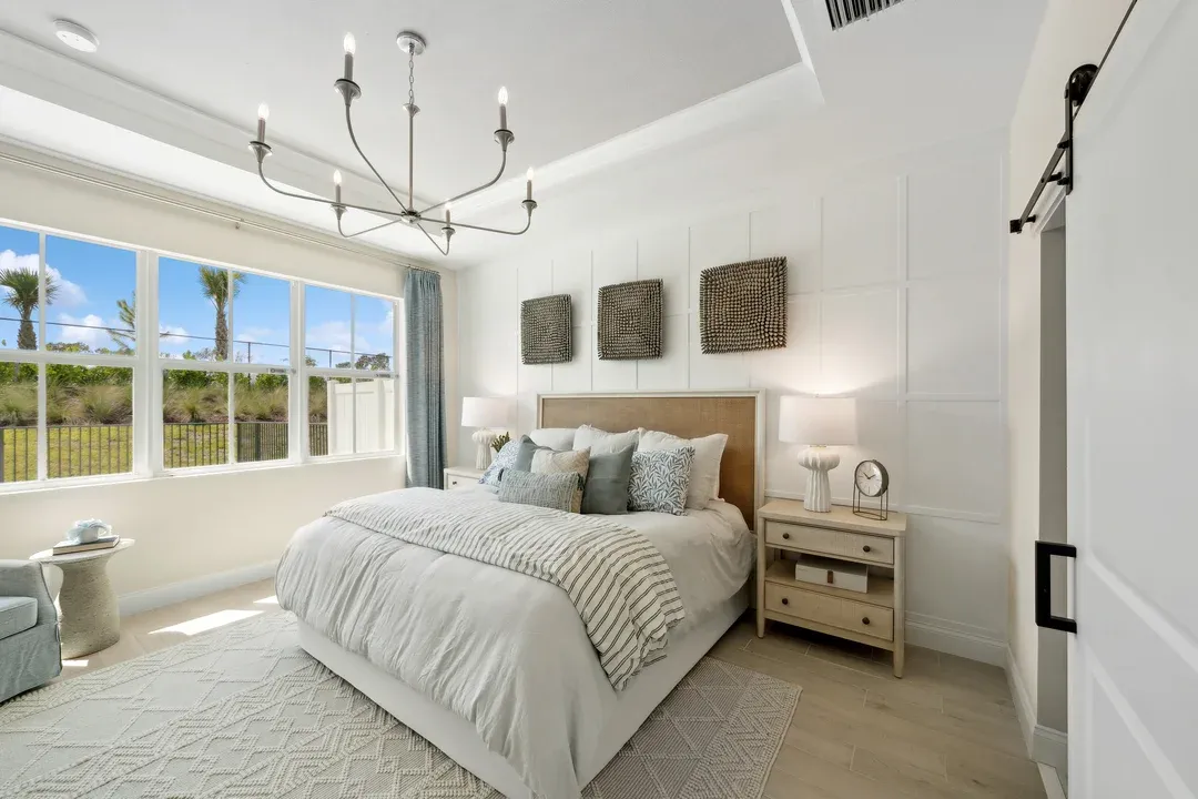 Primary suite with decorative feature wall