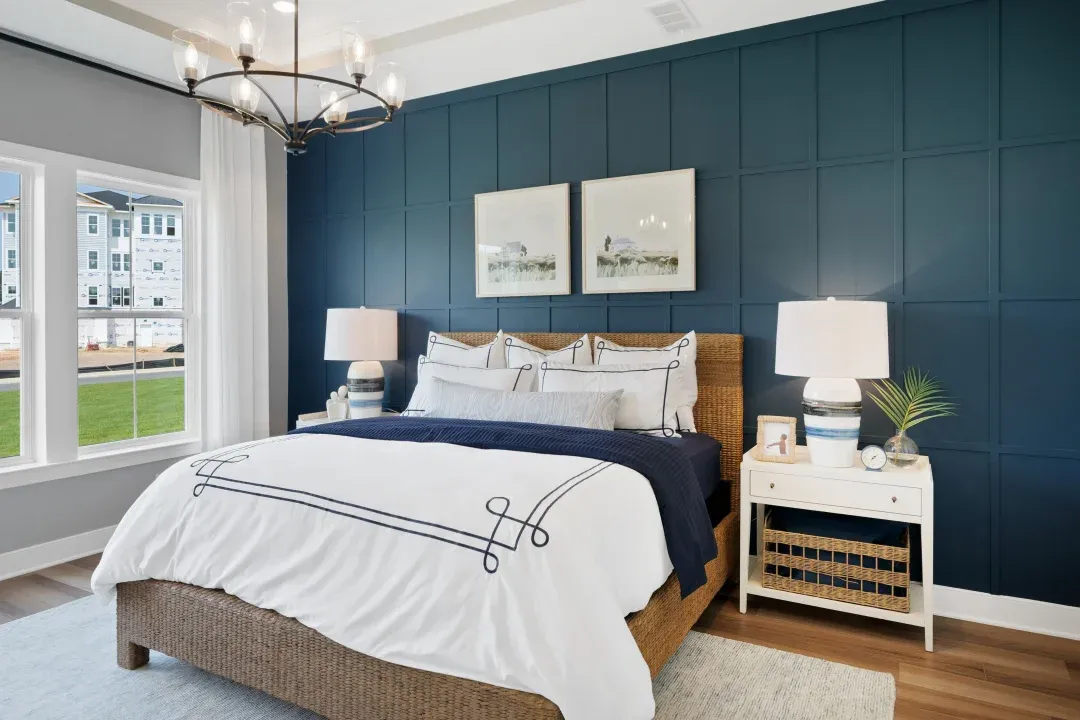Primary suite with decorative feature wall