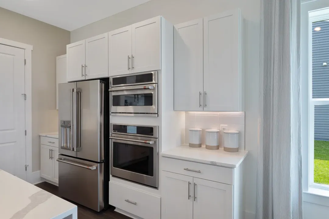 Kitchen with built-in appliances