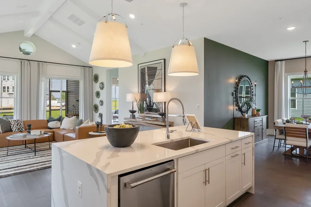 Kitchen with vaulted ceiling and painted ceiling beams