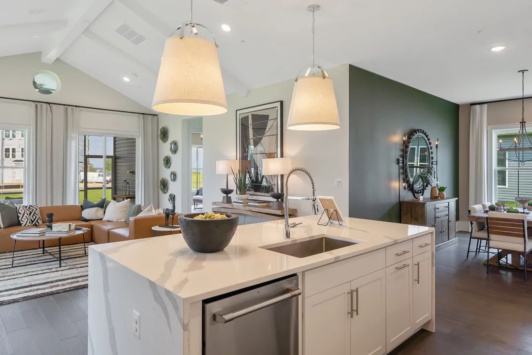 Kitchen with vaulted ceiling and painted ceiling beams
