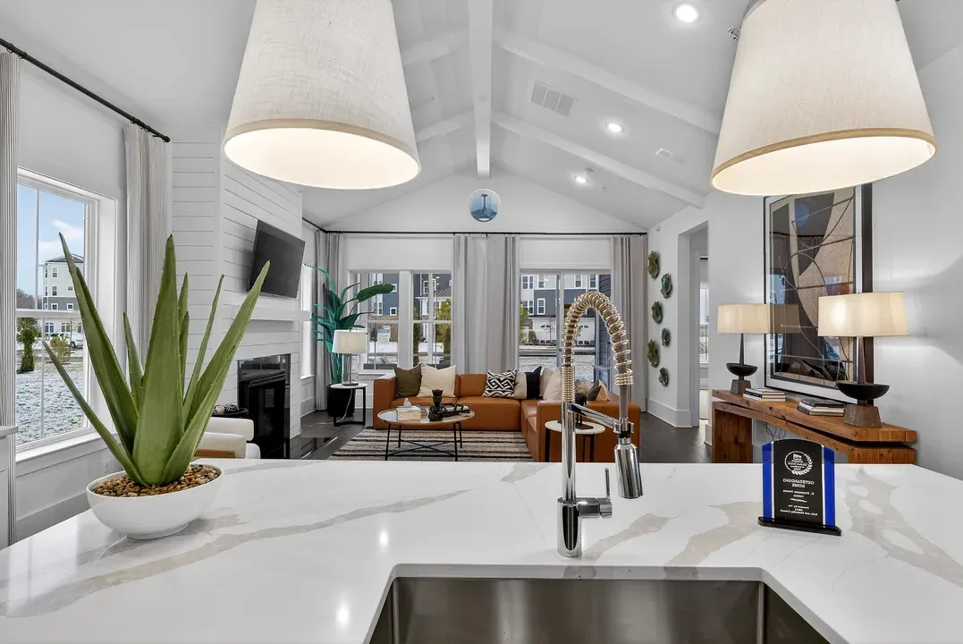 Kitchen with vaulted ceiling and painted ceiling beams