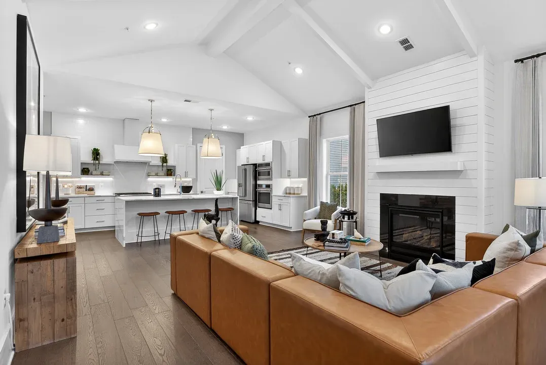 Great room with vaulted ceiling and painted ceiling beams