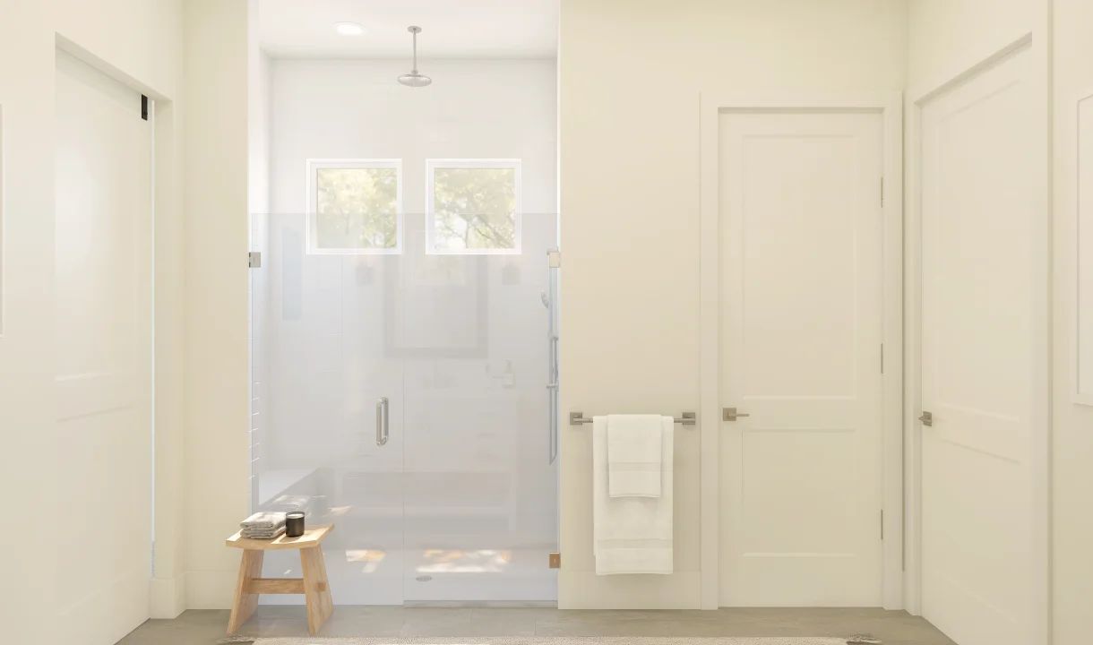 Primary bath with glass-shower enclosure