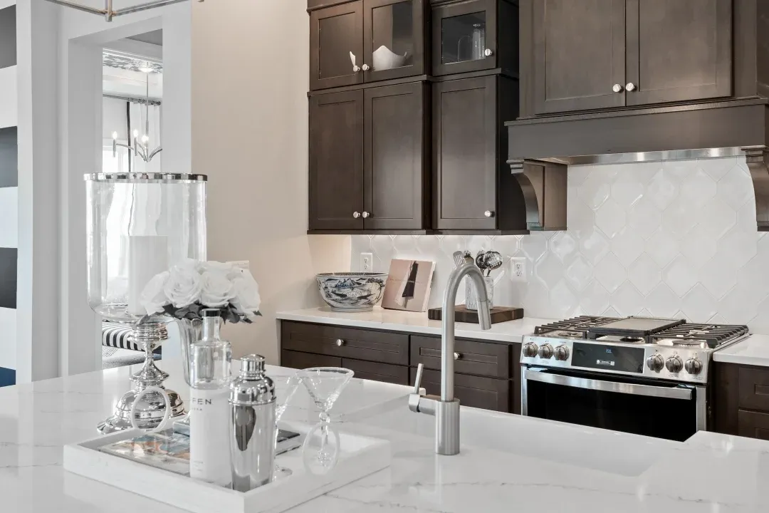 Kitchen with decorative tile backsplash