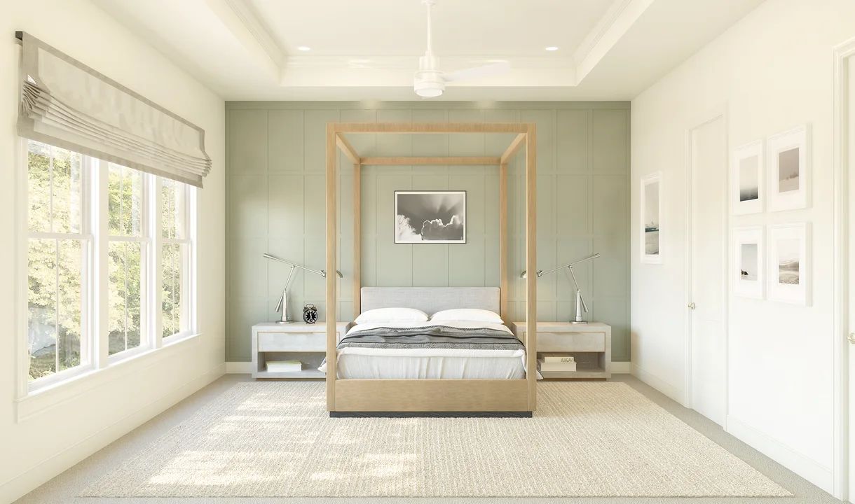 Primary suite with tray ceiling and decorative feature wall