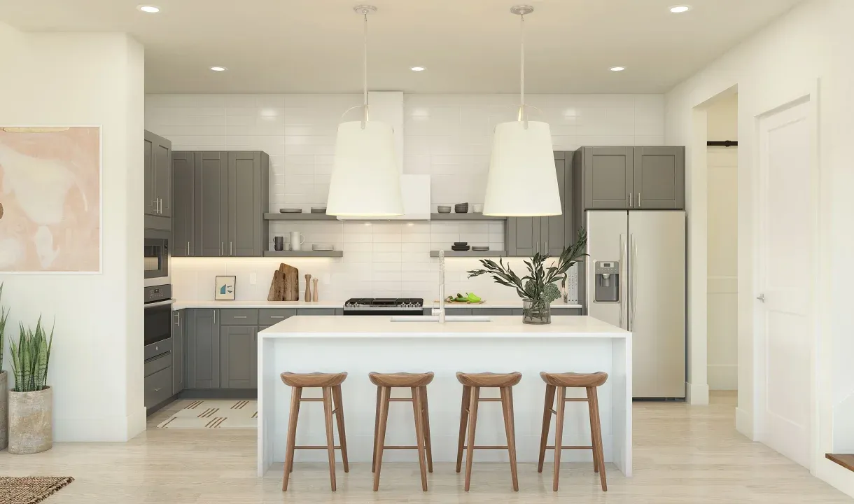 Kitchen with waterfall island and pendant lighting