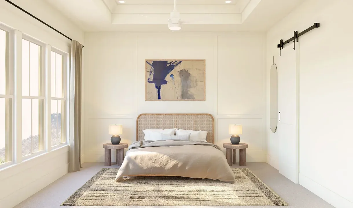 Primary suite with tray ceiling and decorative feature wall