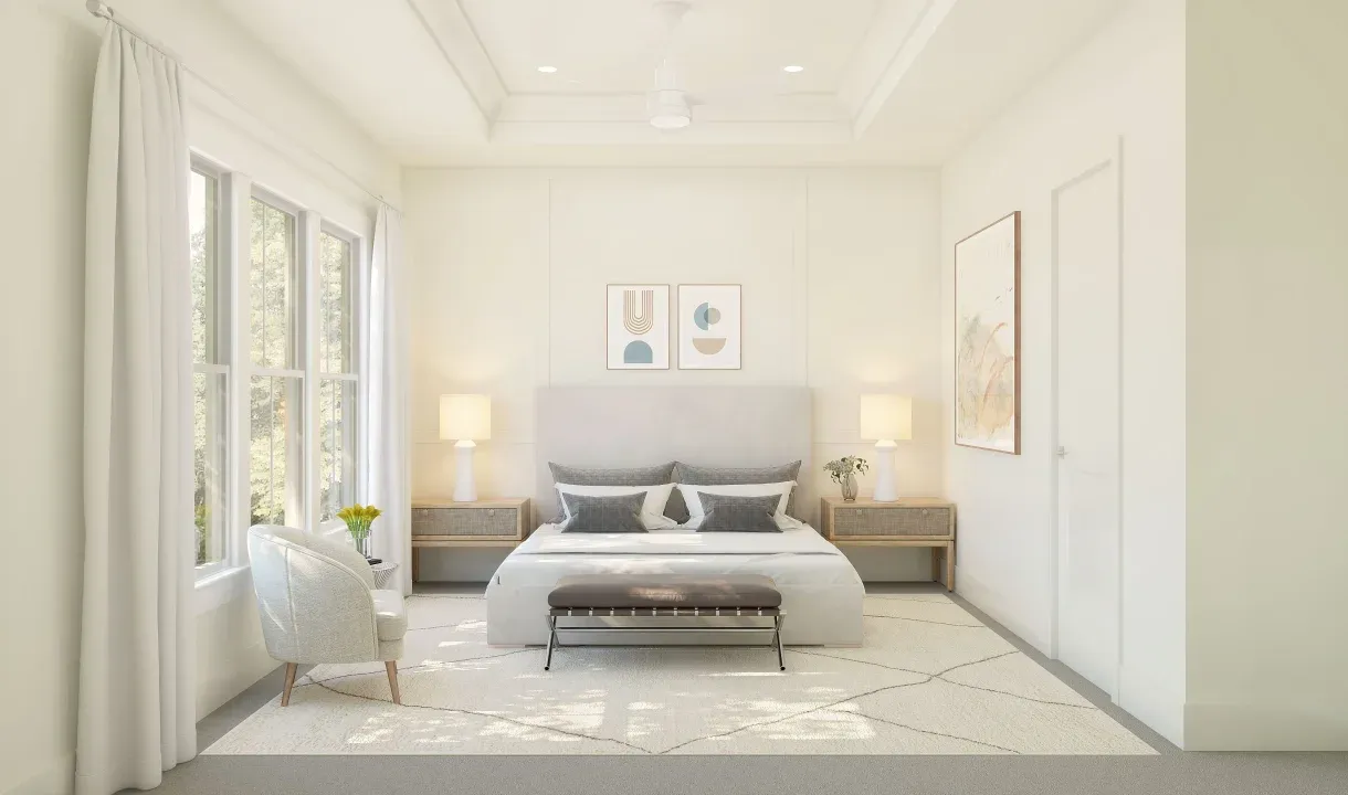 Primary suite with tray ceiling and decorative feature wall