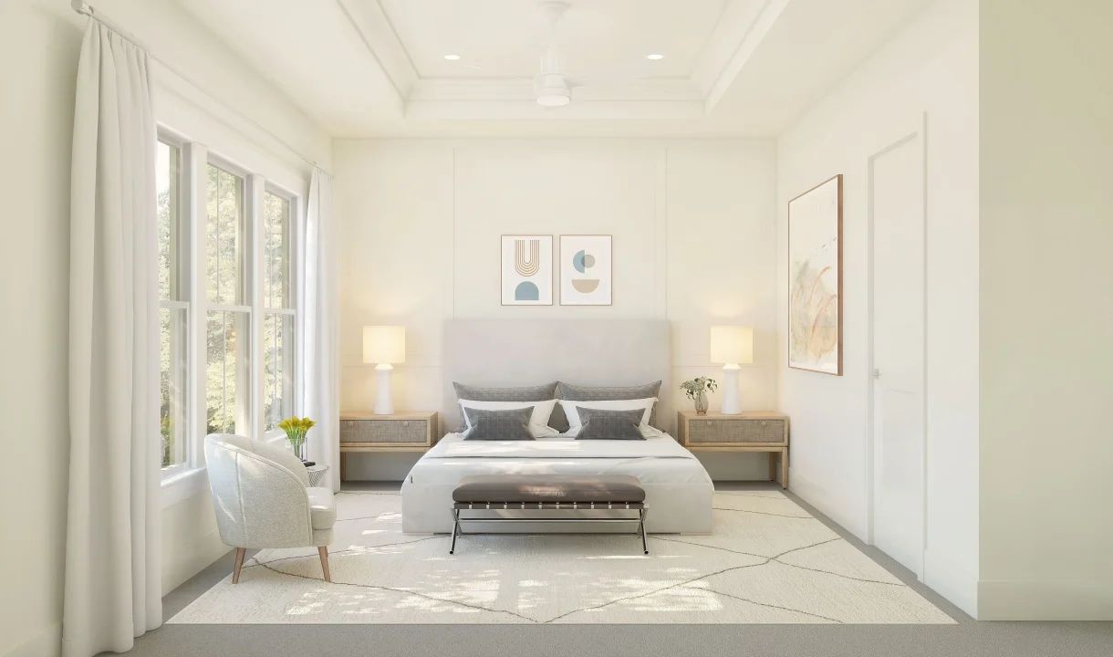Primary suite with tray ceiling and decorative feature wall