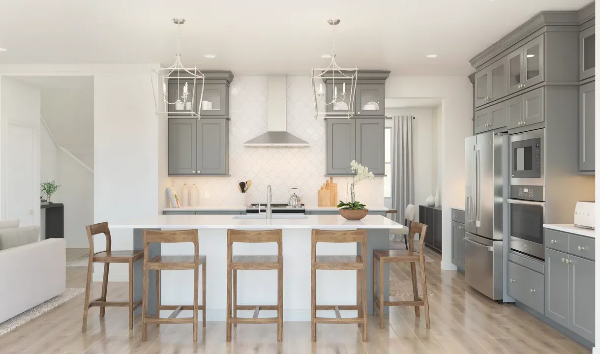 Kitchen with glass upper cabinets and pendant lighting