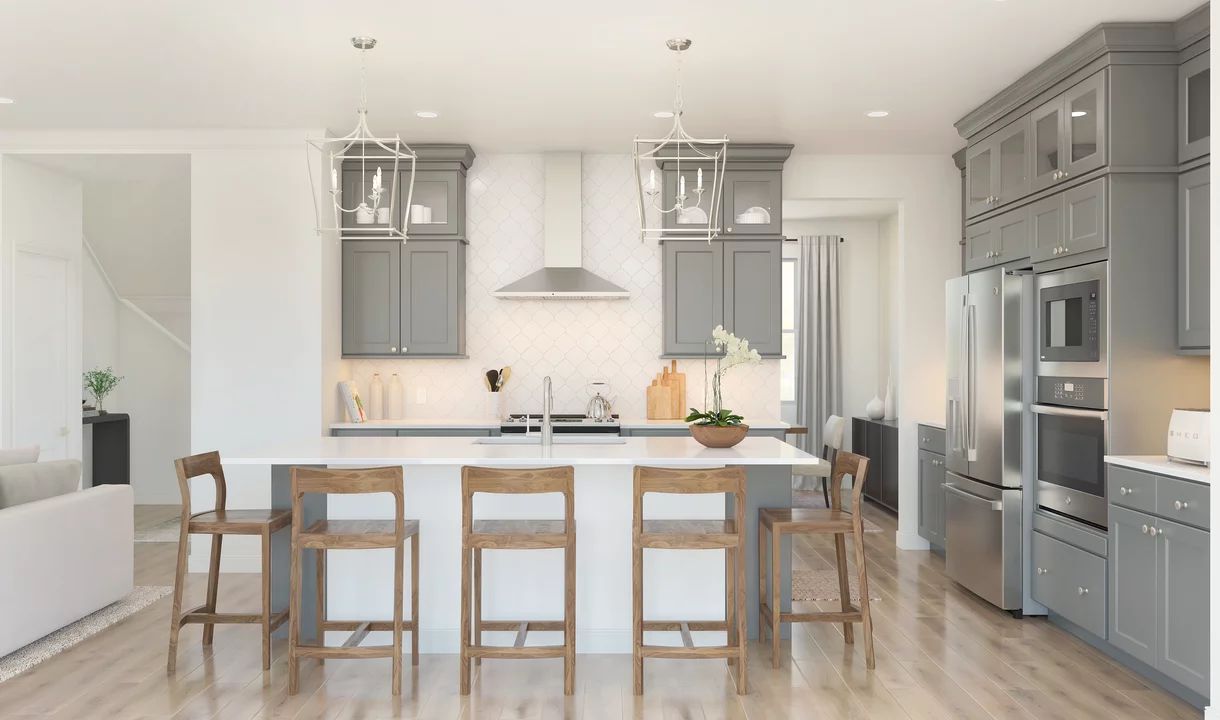 Kitchen with glass upper cabinets and pendant lighting