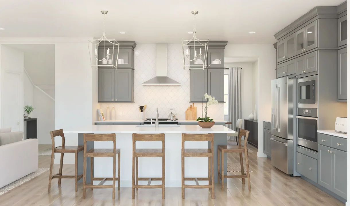 Kitchen with glass upper cabinets and pendant lighting