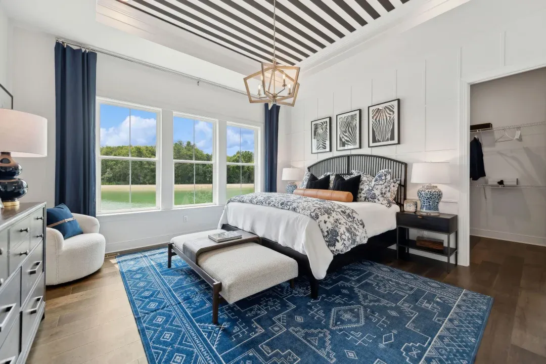 Primary suite with decorative feature wall