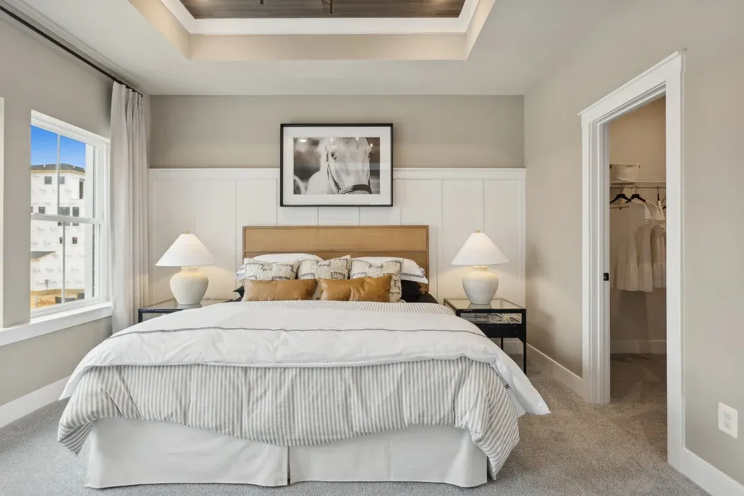 Primary suite with decorative feature wall