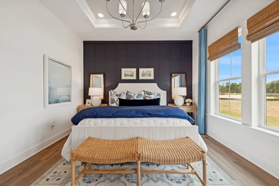 Primary suite with decorative feature wall