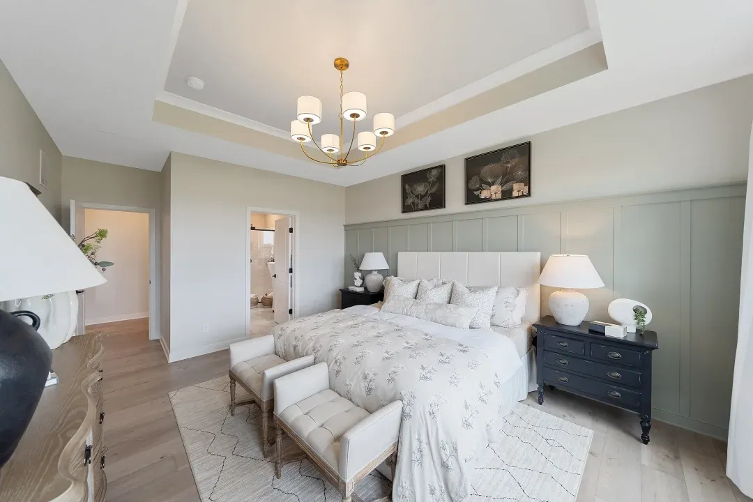 Primary suite with decorative feature wall