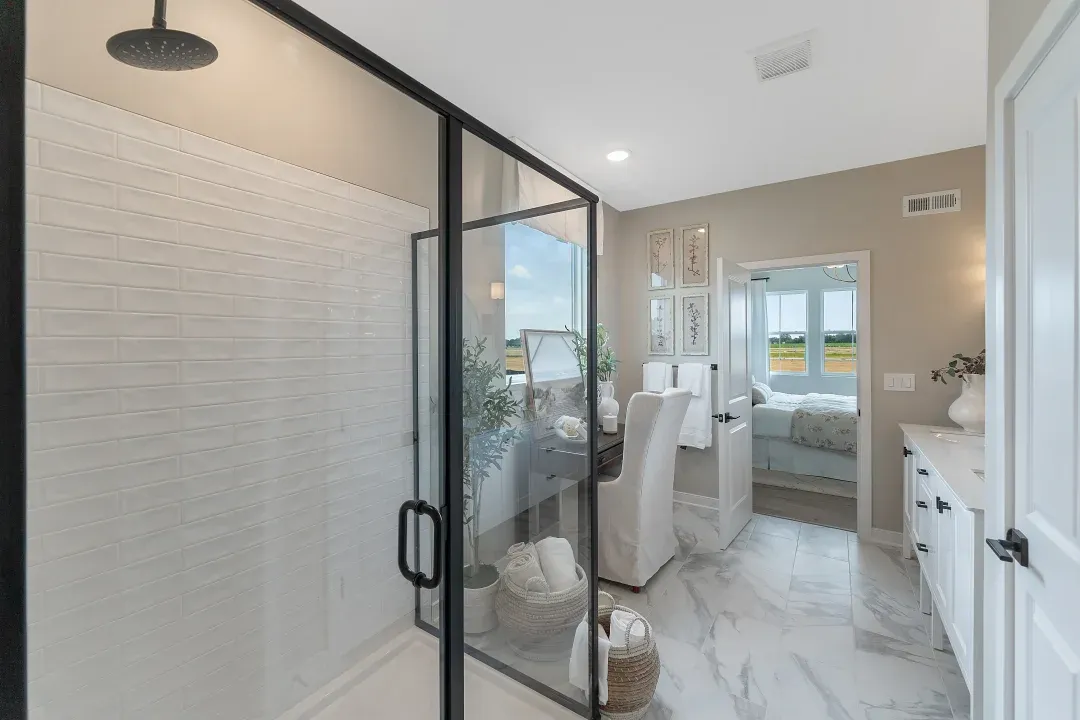 Primary bath with glass shower enclosure