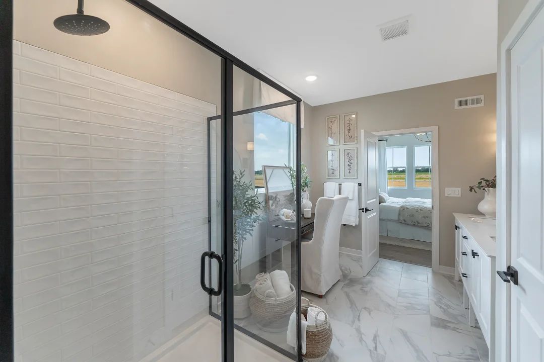 Primary bath with glass shower enclosure