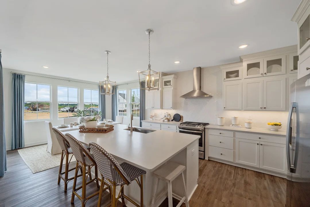 Kitchen with glass upper cabinets