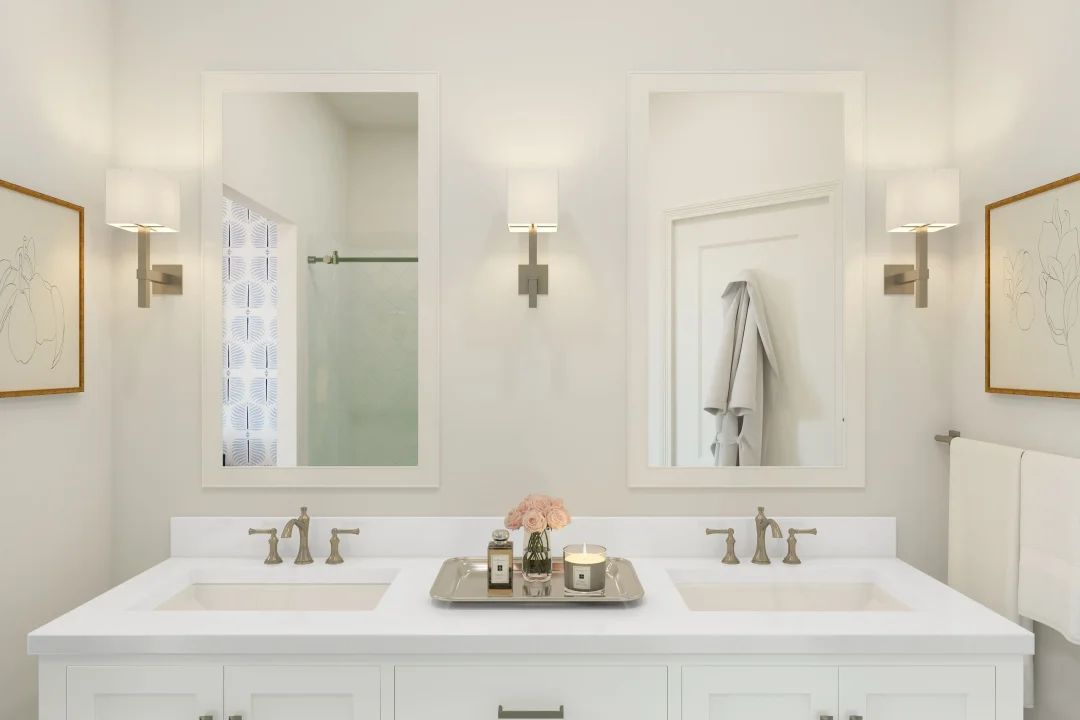 Primary bath with white-framed mirrors