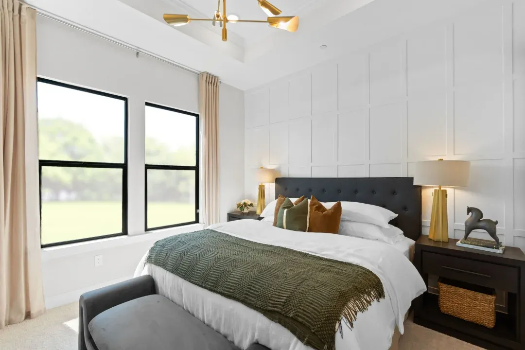 Primary suite with decorative feature wall