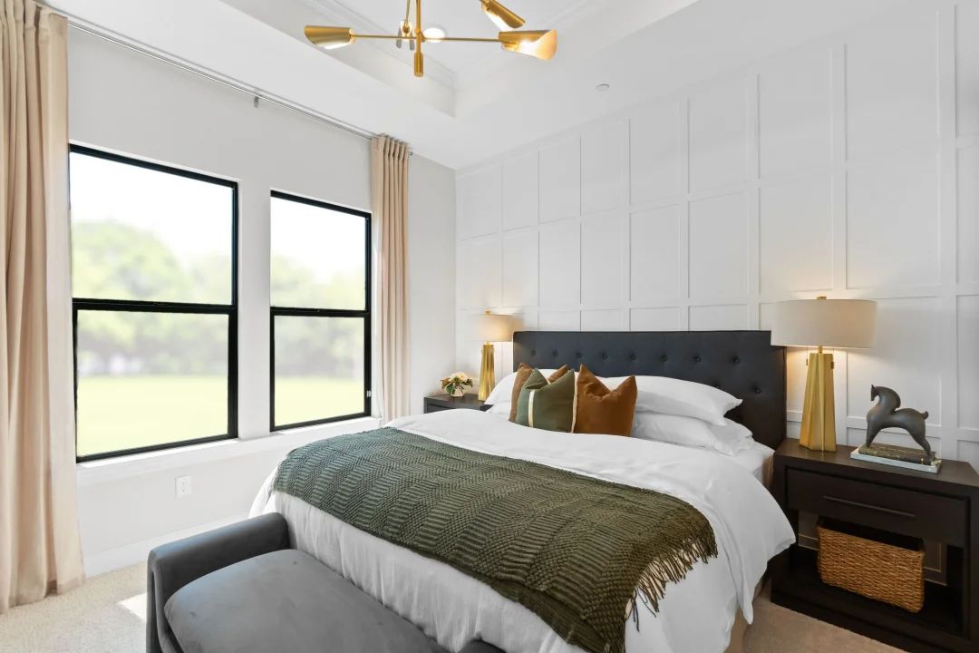 Primary suite with decorative feature wall