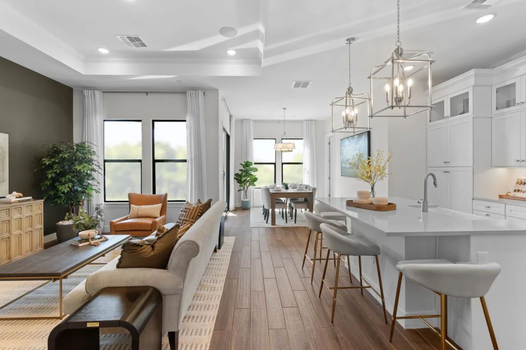 Great room with tile flooring across first floor