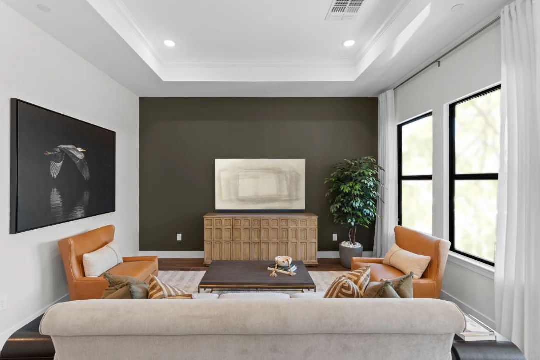 Great room with coffered ceiling and gorgeous tile