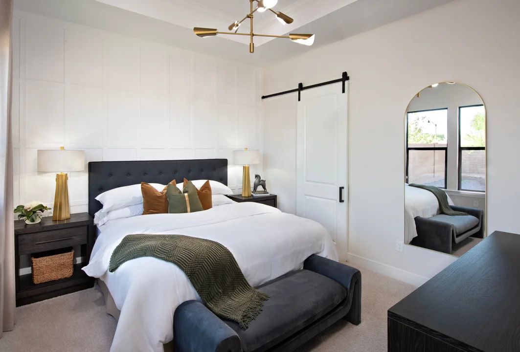 Primary suite with decorative feature wall