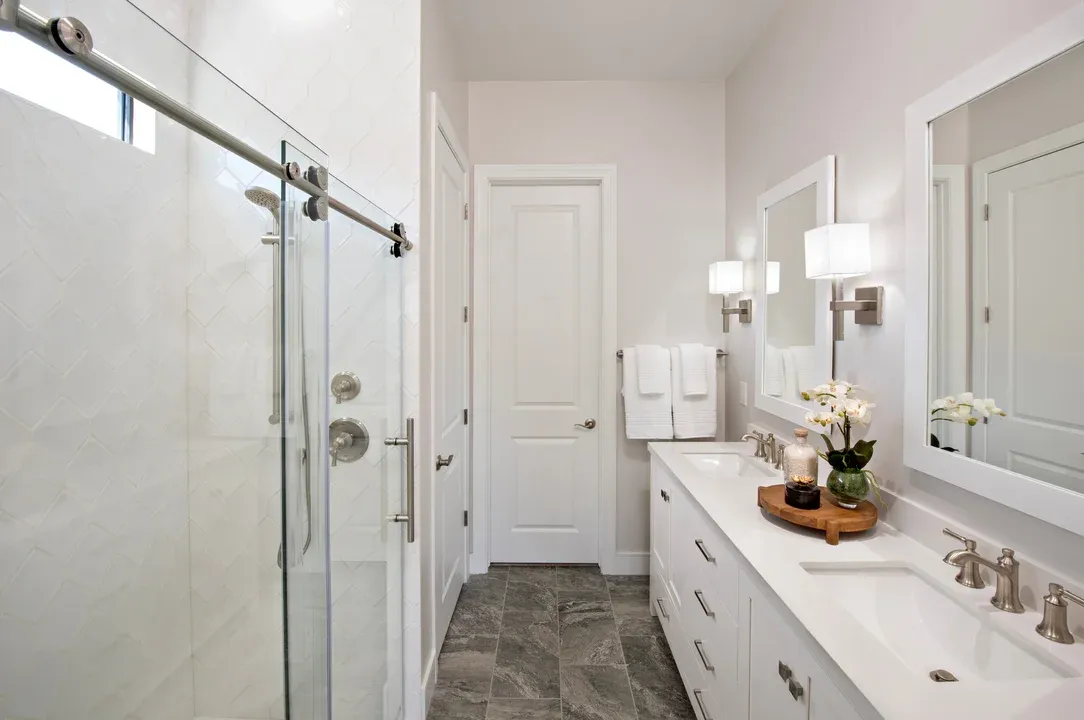 Primary bath with glass shower enclosure