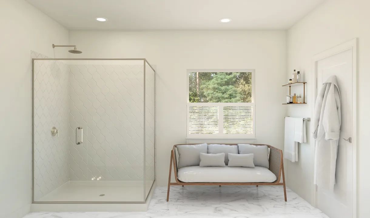 Primary bath with glass shower enclosure
