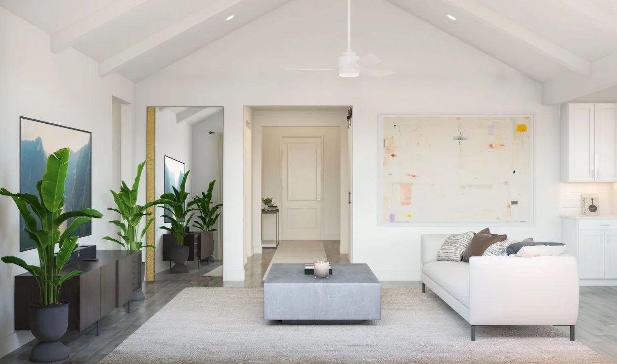 Great room with white painted ceiling beams & vaulted ceiling