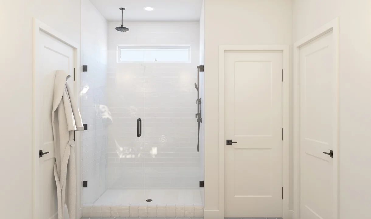 Primary bath with glass shower enclosure