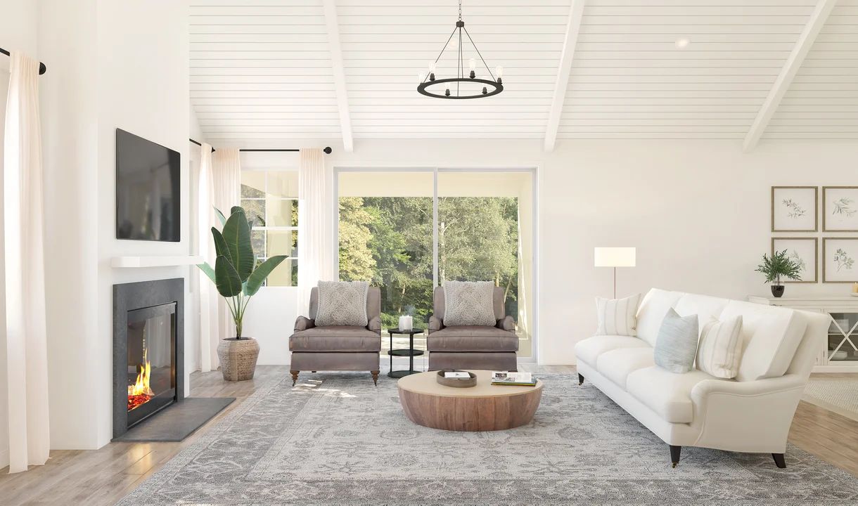 Great room with painted white ceiling beams & vaulted ceiling