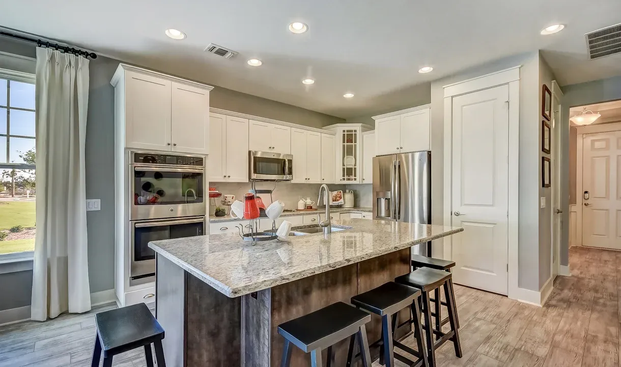 Kitchen with breakfast bar at island