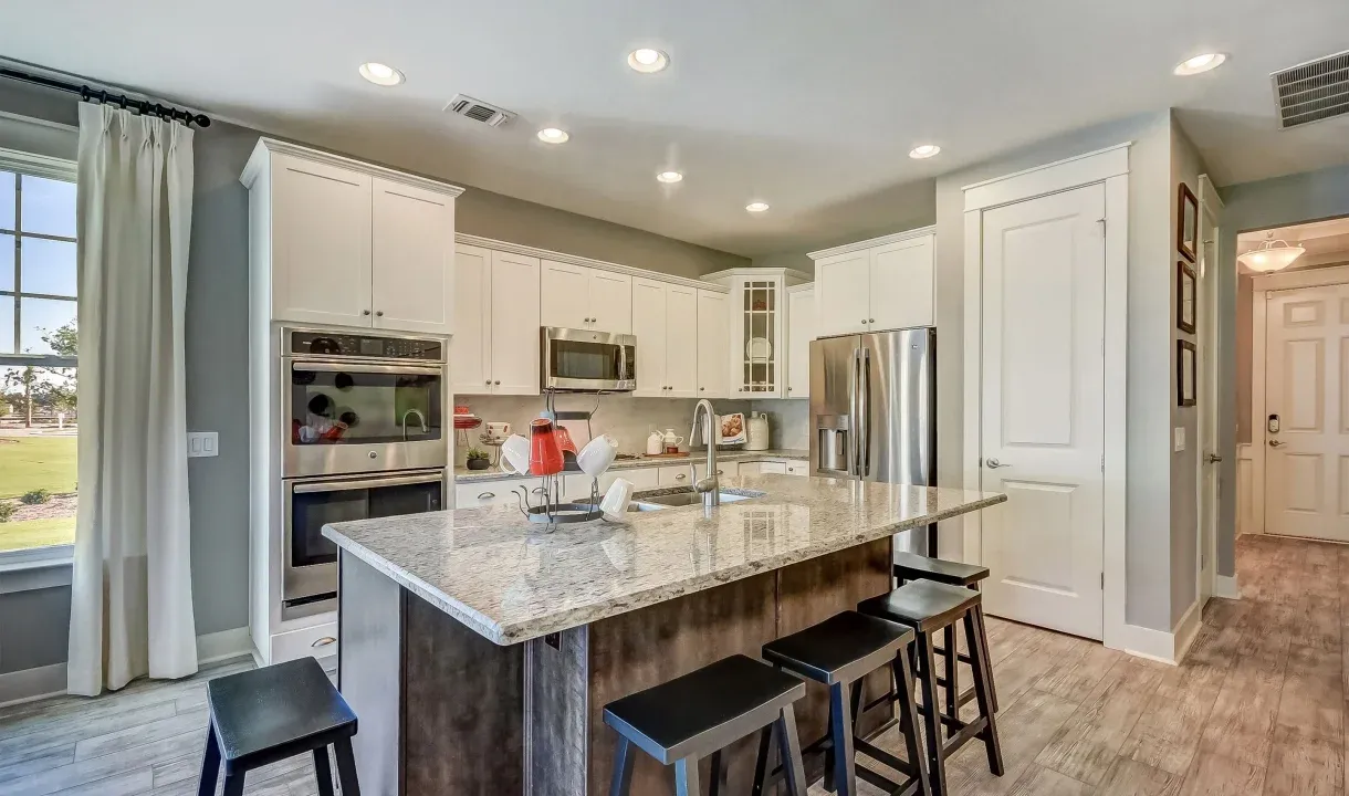 Kitchen with breakfast bar at island