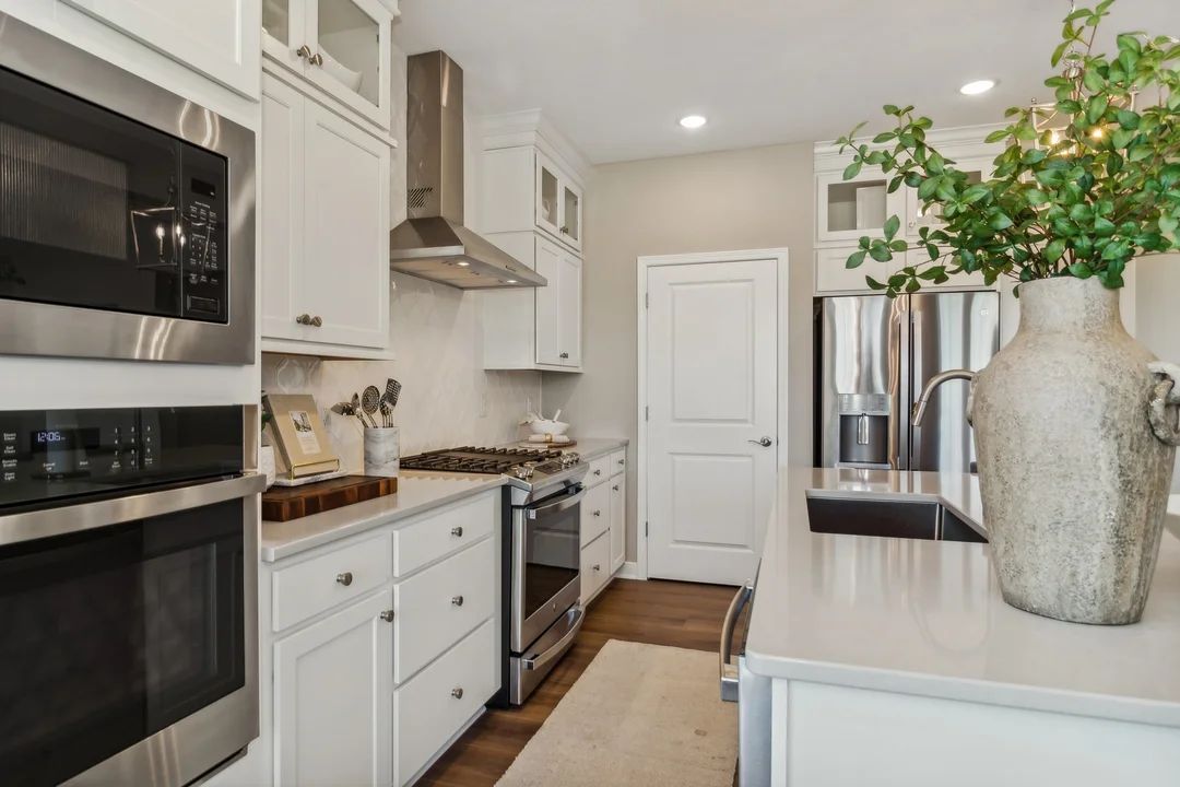 Kitchen with glass upper cabinets
