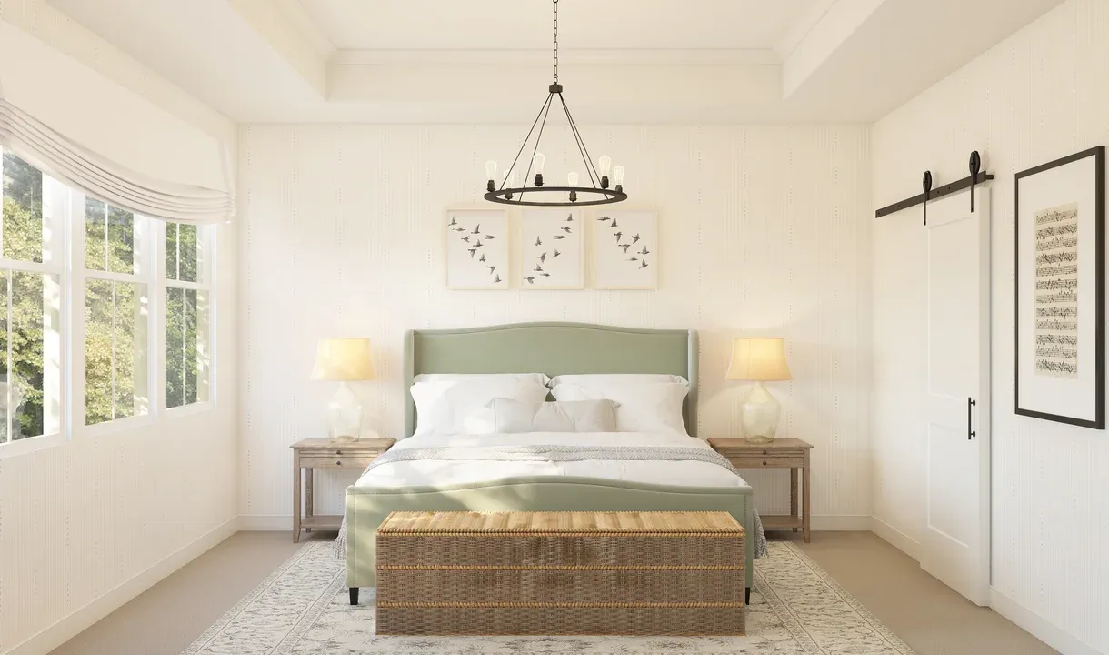 Primary suite with crown moulding and chandelier