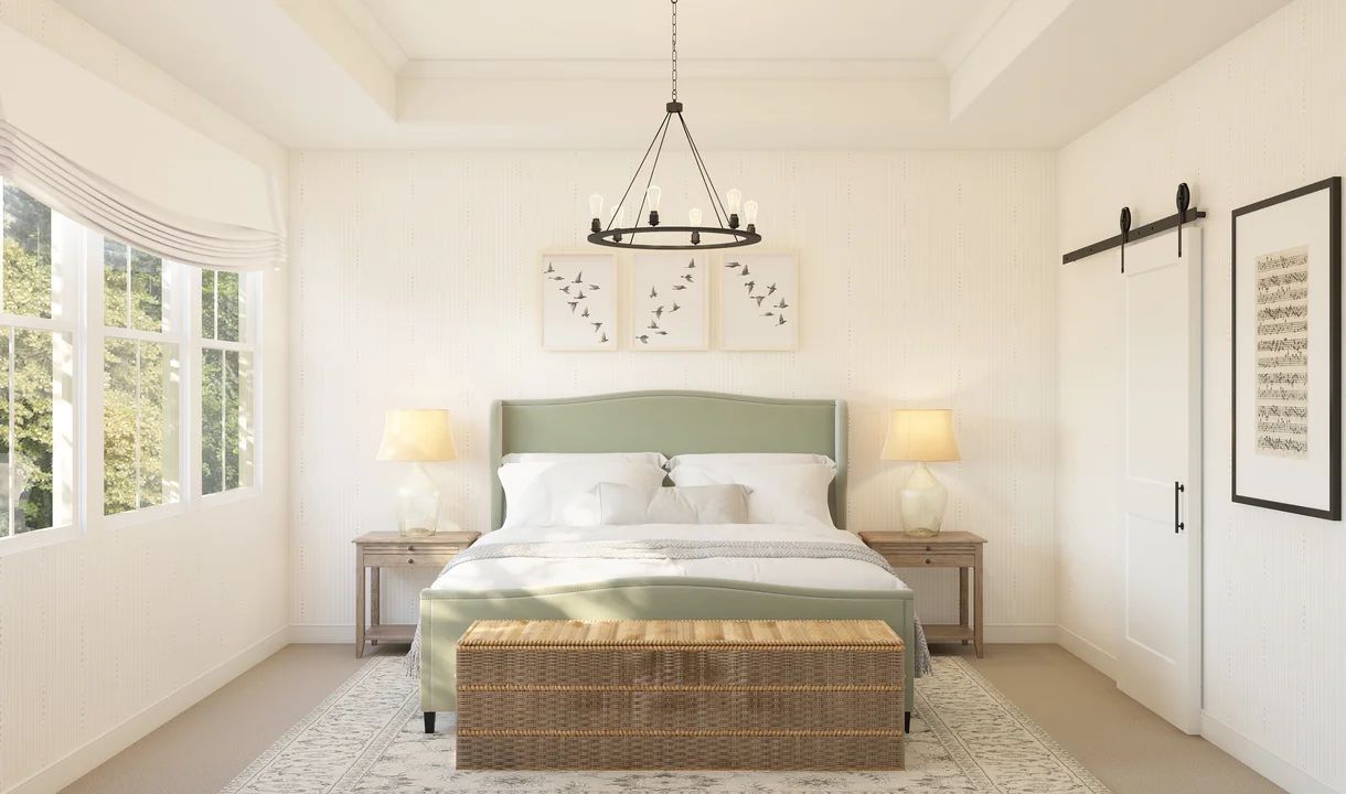 Primary suite with crown moulding and chandelier