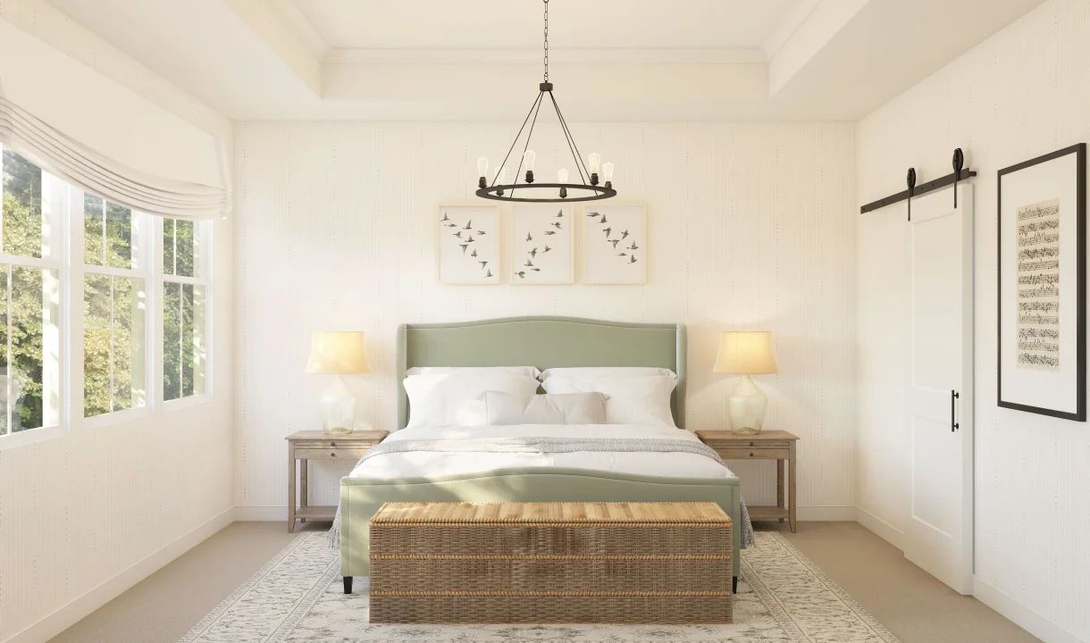 Primary suite with crown moulding and chandelier