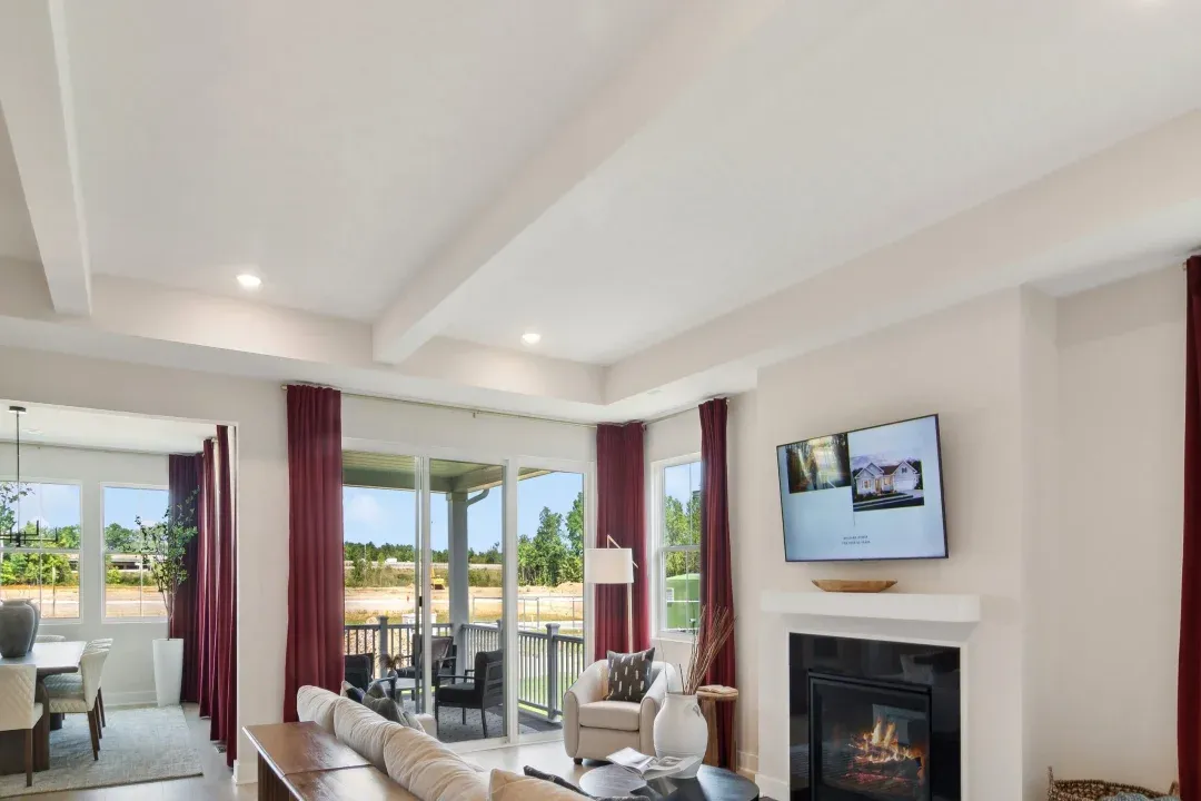 Great room with white ceiling beams