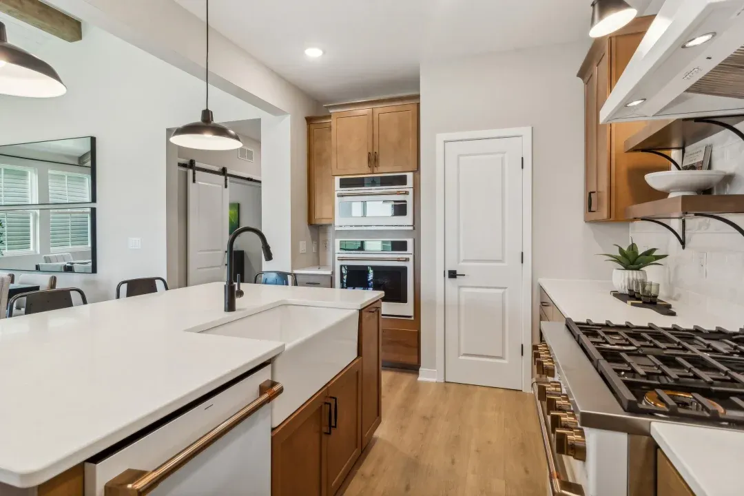 Kitchen with apron sink in island