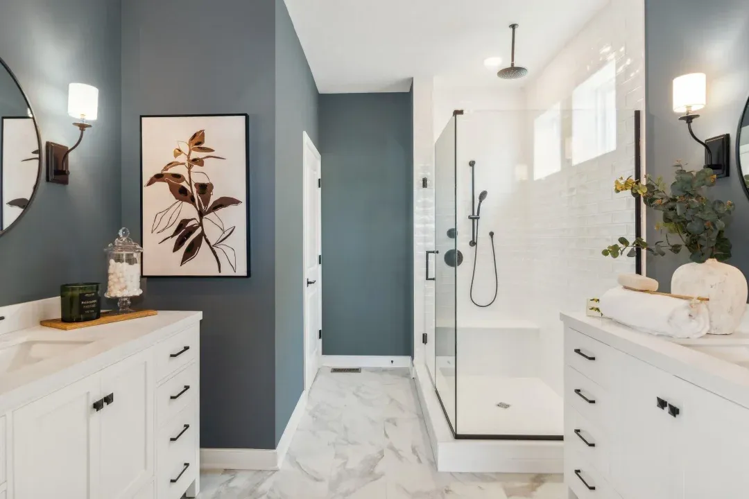 Primary bath with freestanding vanities