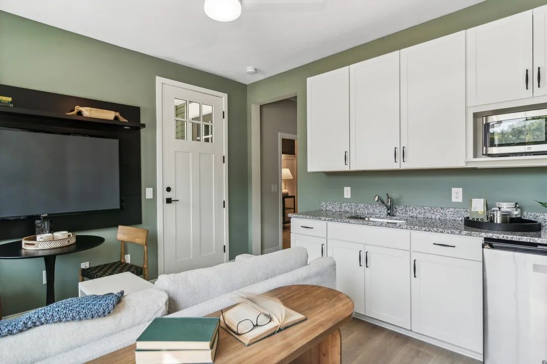 Extra Suite Plus living room with kitchenette and private entry