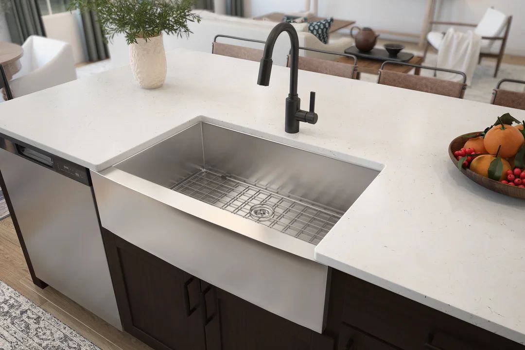 Stainless steel apron-front sink with matte black faucet