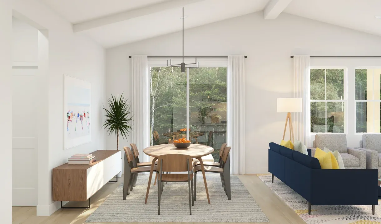 Dining area with vaulted ceiling and white ceiling beams