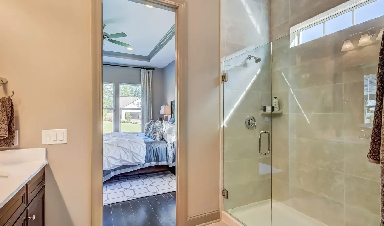 Primary bath with glass shower enclosure