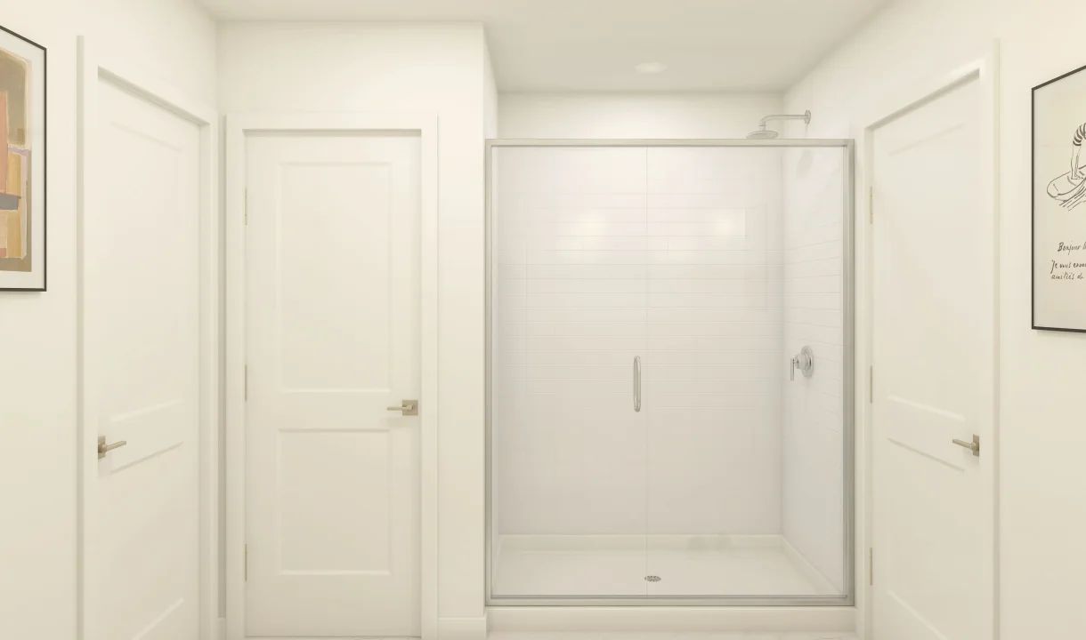 Primary bath with glass shower enclosure